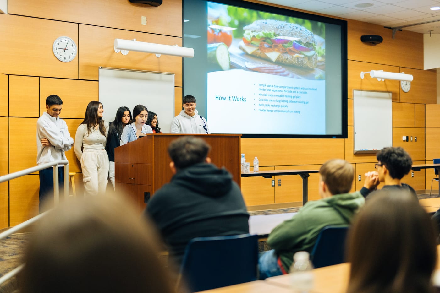 A SparkLab team presenting their business plan